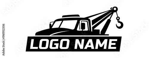 Obraz na plátně Monochromatic silhouette logo design featuring a heavy-duty tow truck with a prominent crane and hook, ideal for towing services or automotive businesses