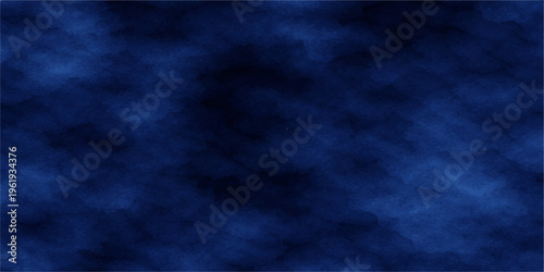 A dark blue grunge background with a smoky texture featuring stormy clouds and a faint night sky light pattern on a blank paper design backdrop