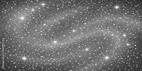 Glistening rain drops on the window merge with falling snowflakes and magic blue light to create a cold winter night sky texture for a Christmas holiday celebration design