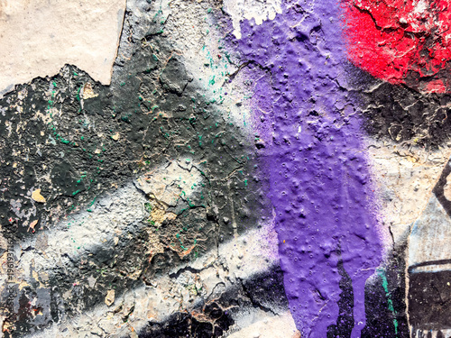 A contemporary urban wall serves as a distinctive background frame