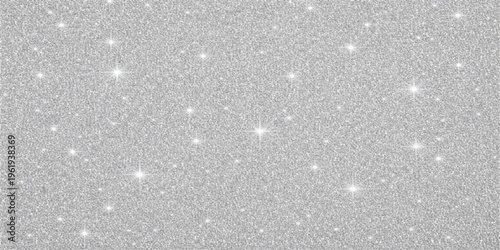 Falling blue snowflakes create a cold winter texture on the window glass with a nature pattern of ice and water drops against a gray holiday background