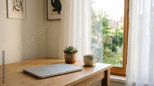 A serene workspace with a laptop, coffee, and plant by a sunny window
