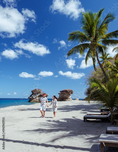 Valokuva Explore breathtaking beaches of Saint Lucia with a couple walking hand in hand u