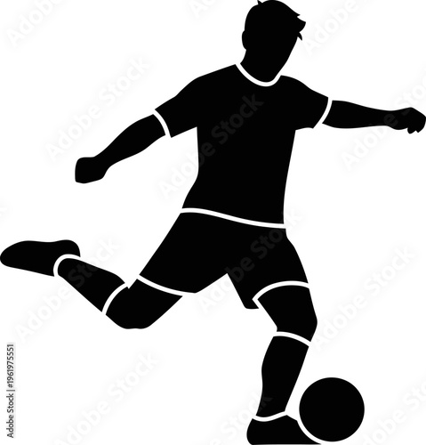 Soccer player kicking a ball in motion