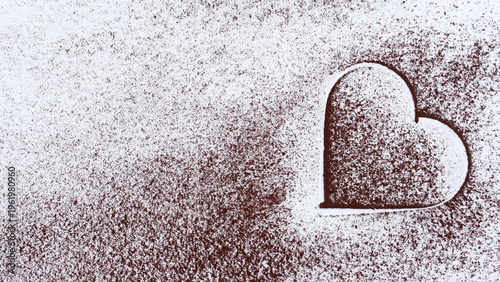 Cocoa powder on a white background, cocoa powder heart, copy space for text