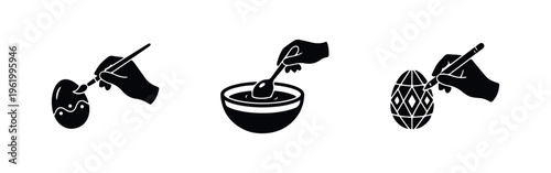 Black and white icons of hands decorating Easter eggs with a paintbrush, dipping in dye, and drawing patterns. Minimalist holiday craft concept.