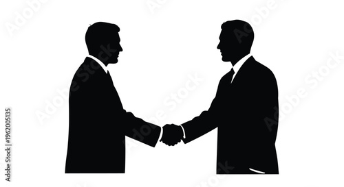 Two business professionals shake hands a striking black silhouette