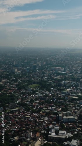 Wallpaper Mural Davao City with residential area and modern buildings. Mindanao, Philippines. Vertical view. Torontodigital.ca