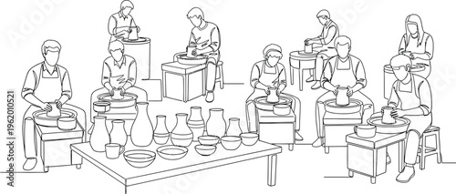 people working at desks in office