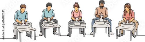 people sitting at desks working on computers