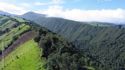 Farming fields and lush tropical forests on the foot of the Rumiñahui volcano near Machachi. Mejía Canton, Pichincha Province.