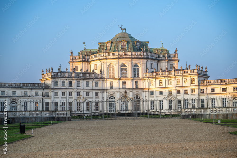 Fototapeta premium Stupinigi, turin, italy. March 23, 2026. Stupinigi hunting lodge, a baroque masterpiece near turin, italy, presenting its grand architecture and entrance gate