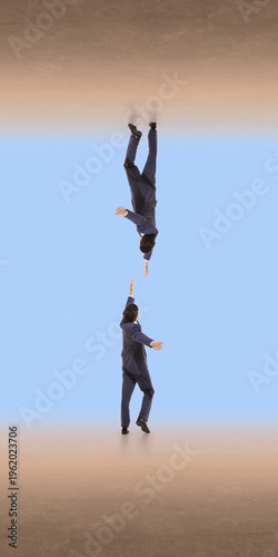 Businessman falling downward while reaching toward another hand in abstract space. Concept of risk failure support rescue, crisis situation and need for help in business environment.