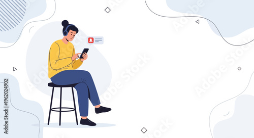 Young man with headphones using smartphone while sitting on stool, notification icon
