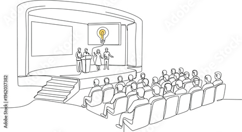 audience listening to presentation in auditorium