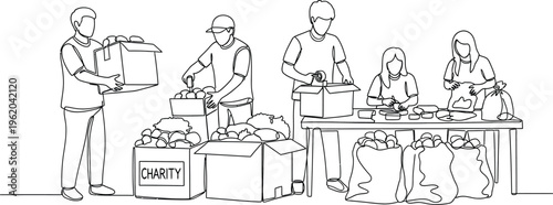 volunteers packing charity food boxes