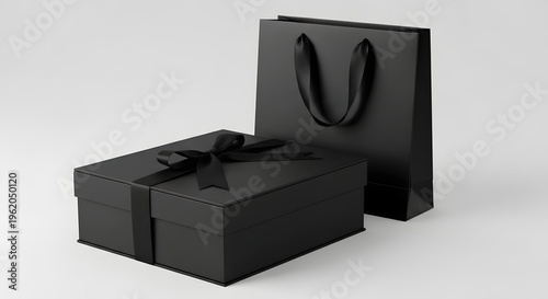 black gift box with ribbon and matching shopping bag ready for celebration