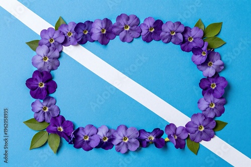 A blue background with purple flowers and a white frame