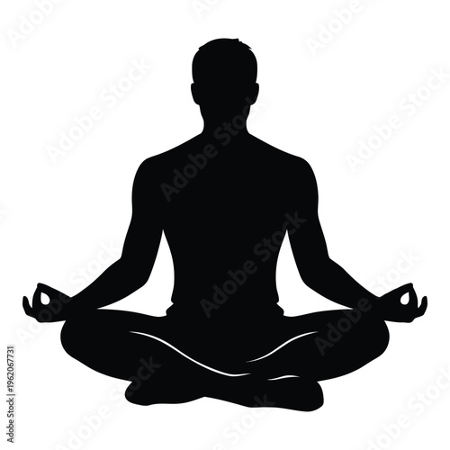 Silhouette of man meditating in lotus pose