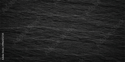 A dark closeup of natural black fabric and leather textures reveals a deep grain pattern that serves as a sophisticated material backdrop for a modern design wallpaper