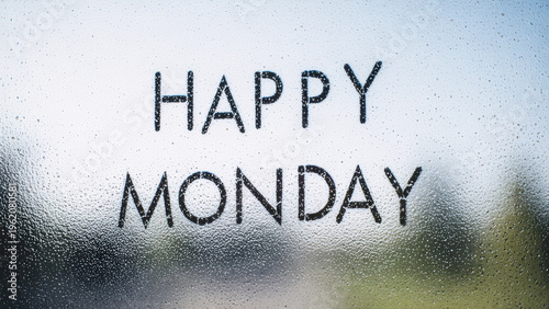 Happy monday text on foggy glass with soft blur outdoor morning feel
