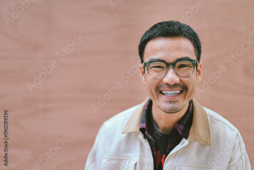 adult asian man.portrait young male.person posing smiling laughing and fun excited surprised thinking positive happy people.empty space for text advertising.background.attractive fashion