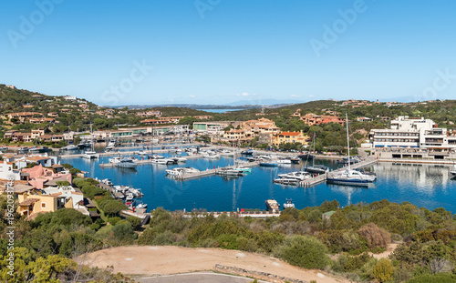 Wallpaper Mural Porto Cervo Marina, one of the main tourist harbors in Sardinia and the Mediterranean, located in the heart of Costa Smeralda, Italy. Luxury marina with yachts and clear turquoise water. Torontodigital.ca