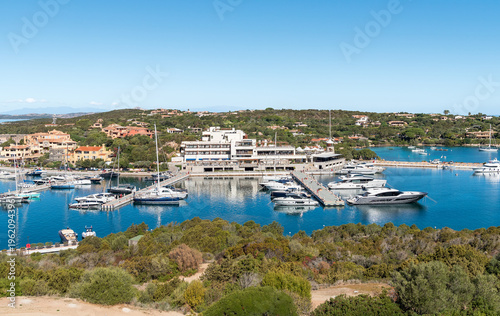 Wallpaper Mural Porto Cervo Marina, one of the main tourist harbors in Sardinia and the Mediterranean, located in the heart of Costa Smeralda, Italy. Luxury marina with yachts and clear turquoise water. Torontodigital.ca
