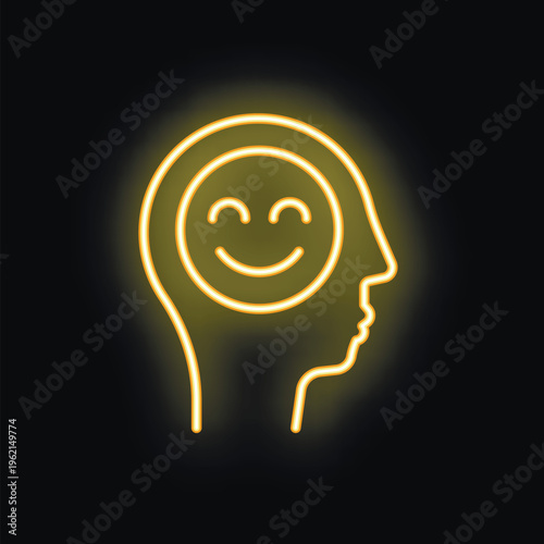 Neon yellow glowing silhouette of a head with a smiling face inside on a black background
