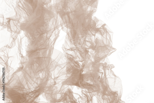 Sepia tulle fabric in blur motion isolated on white background. Abstract study of nude tulle net transparent material.
