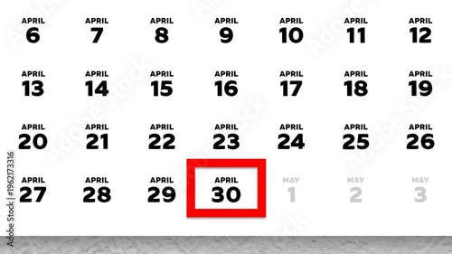 The date April 30th marked with a red cursor on the wall calendar 2026