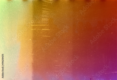 Blank grained film strip texture background with heavy grain, dust and light leak