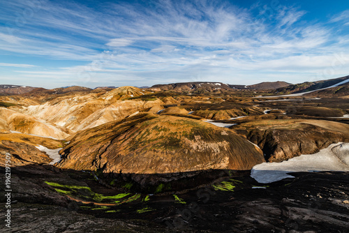 фотографія Sunlit geothermal valley with colorful mineral hills in Landmannalaugar