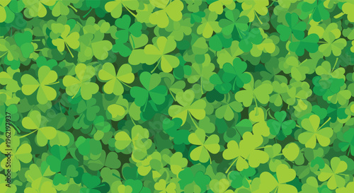 Lush field of vibrant green three leaf clovers and shamrocks creating a dense and luck themed natural background for festive designs.