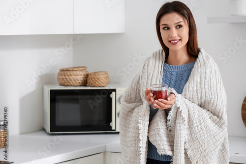 Young woman with plaid and ...