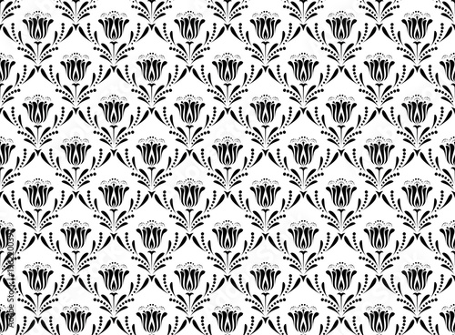 Floral pattern. Seamless vector background. Vintage wallpaper in the Baroque style. White and black ornament for fabric, wallpaper, packaging. Ornate Damask flower illustration.