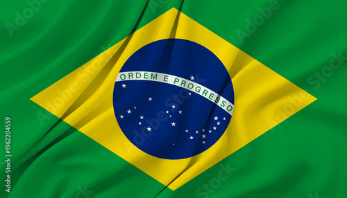 Brazil national flag with globe and motto on rippled green fabric background