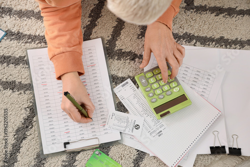 Mature woman in debt using ...