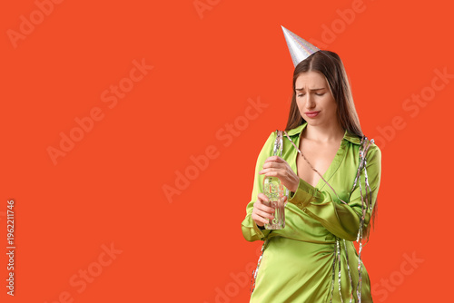 Young woman with hangover a...