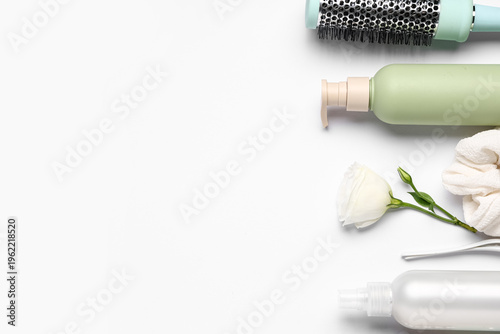 Bottles of hair spray with ...