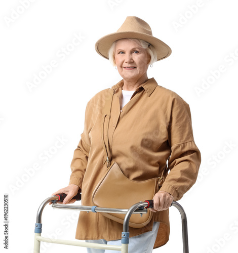 Senior woman in hat with wa...