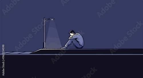 A lone figure sits hunched under a street light at night