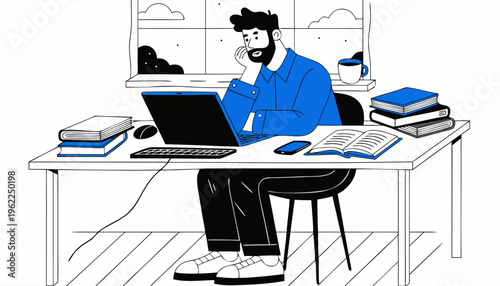 Man Working On Laptop At Desk With Books And Cell Phone In Natural Light