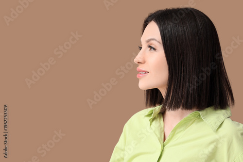 Beautiful young woman with ...