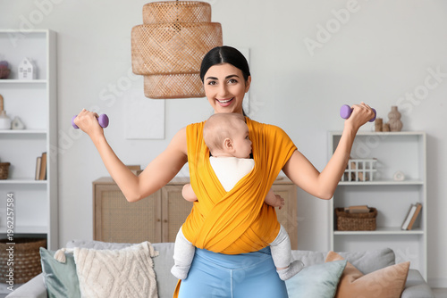 Sporty mother with her baby...