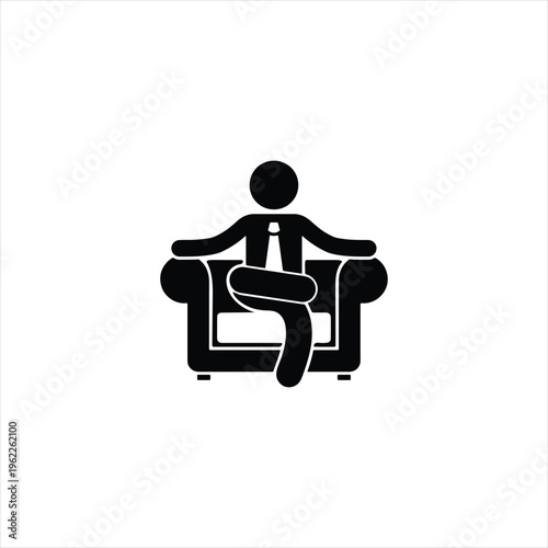 A man sitting on a couch in a relaxed position