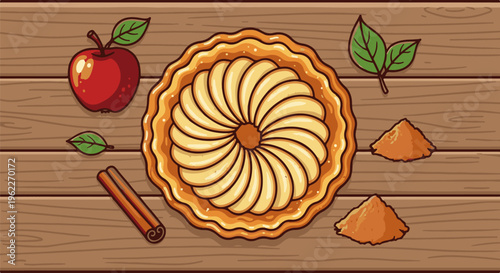 Artistic overhead view of a golden apple pie with apples and cinnamon on wood