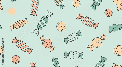 Seamless pattern with hand drawn colorful candies, sweets, and cookies on a light mint background for bakery or candy shop.