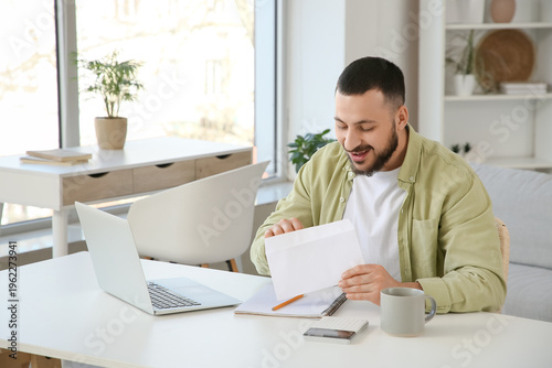 Young man with refund money...