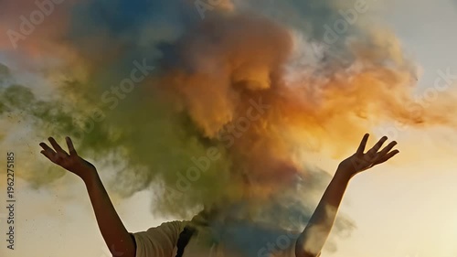 Woman with braided hair joyfully celebrates the Holi festival, throwing vibrant colored powders into the air against a sunset backdrop, showcasing the festive spirit and cultural significance of the e
